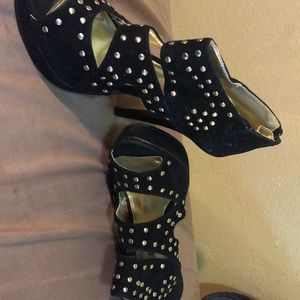Black and gold high heels name brand bumper
